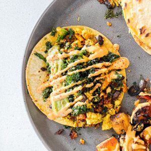 healthy vegan chipotle crema sauce on tofu scramble breakfast tacos